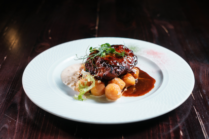 Pork with mini potatoes, forest mushrooms in sour cream and Chipotle sauce